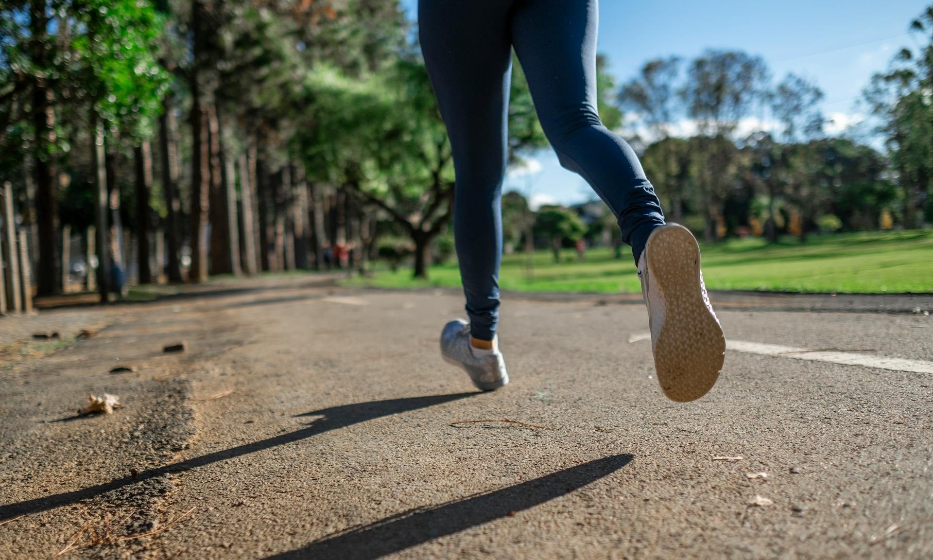 Woman legs running jogging outdoors