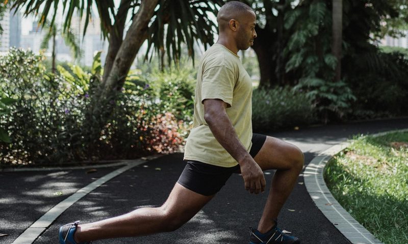 Man doing lunge outside