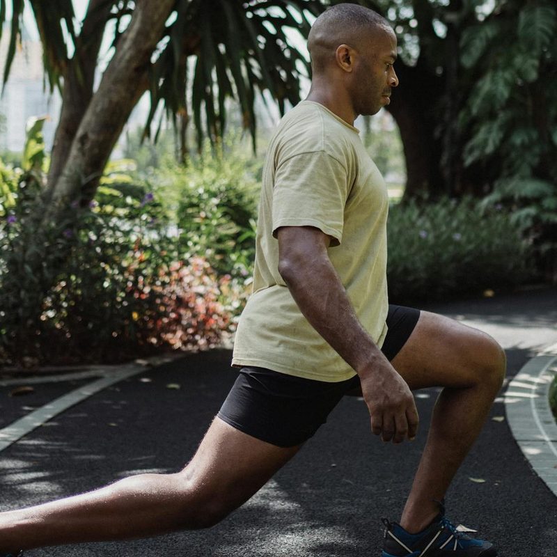 Man doing lunge outside