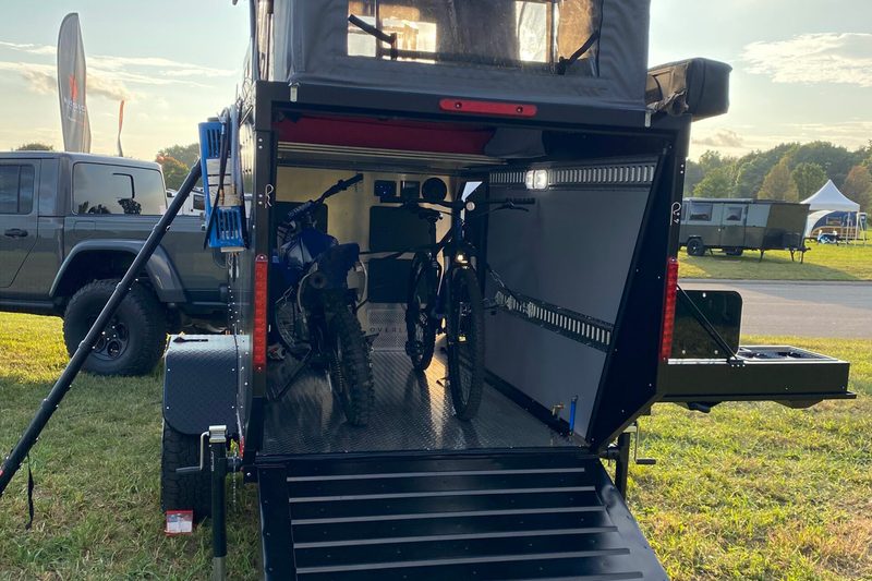 Rear toy hauler ramp of Mission Overland's Trail Dog camper trailer.