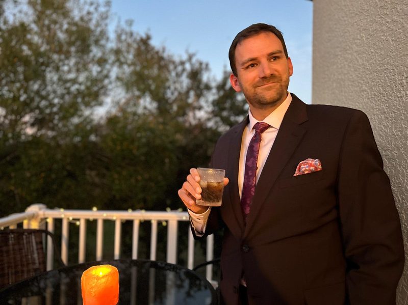 Man in Men's Wearhouse Burgundy Suit