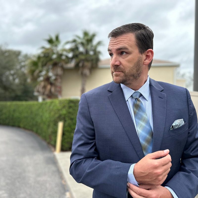 Man in Men's Wearhouse Blue Suit