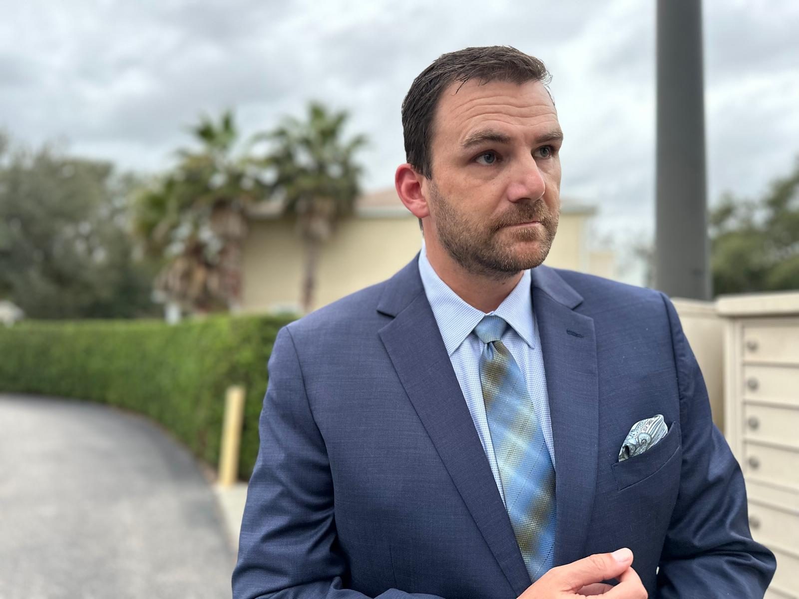 Man in Men's Wearhouse Blue Suit