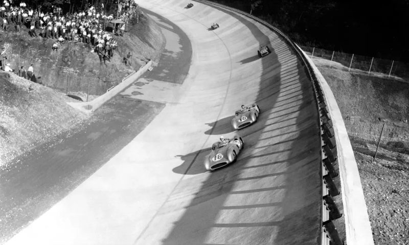 1954 Mercedes-Benz W 196 R Stromlinienwagen Stirling Moss leading Juan Fangio in the 1955 Italian Grand Prix in Monza.