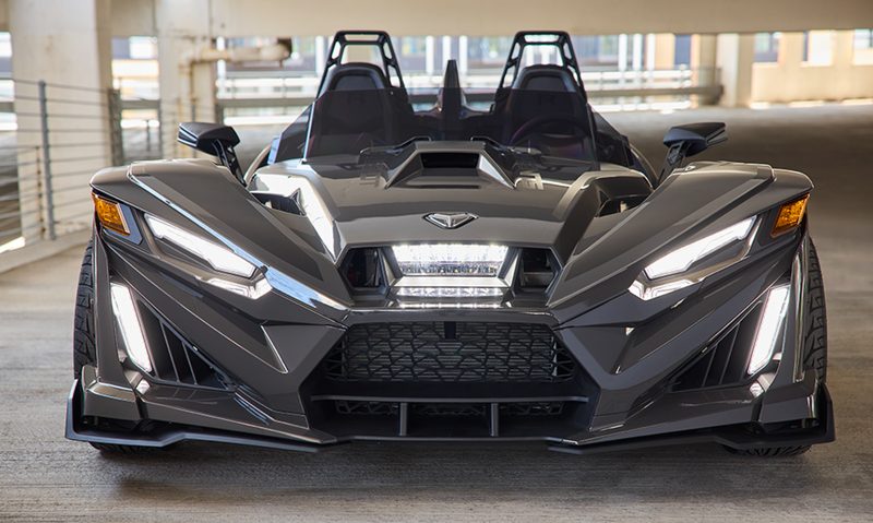 2025 Polaris Slingshot R parked in a garage direct frontal view.
