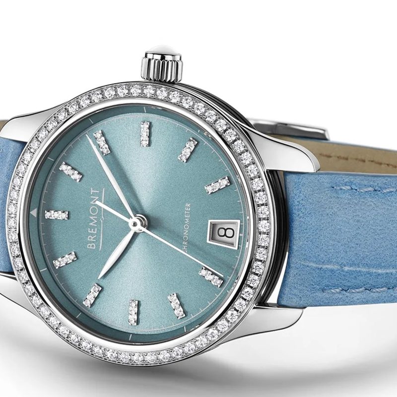 A blue Bremont watch for women laying on its side
