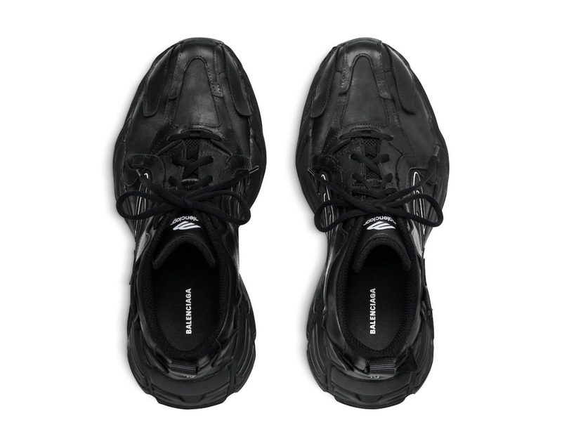 overhead product photo of black balenciaga sneaker