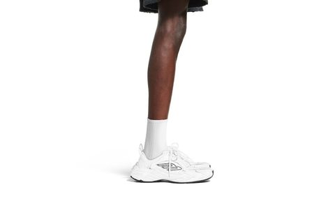 man wearing white balenciaga sneaker