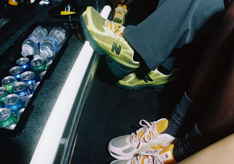 person wearing green sneaker in limo