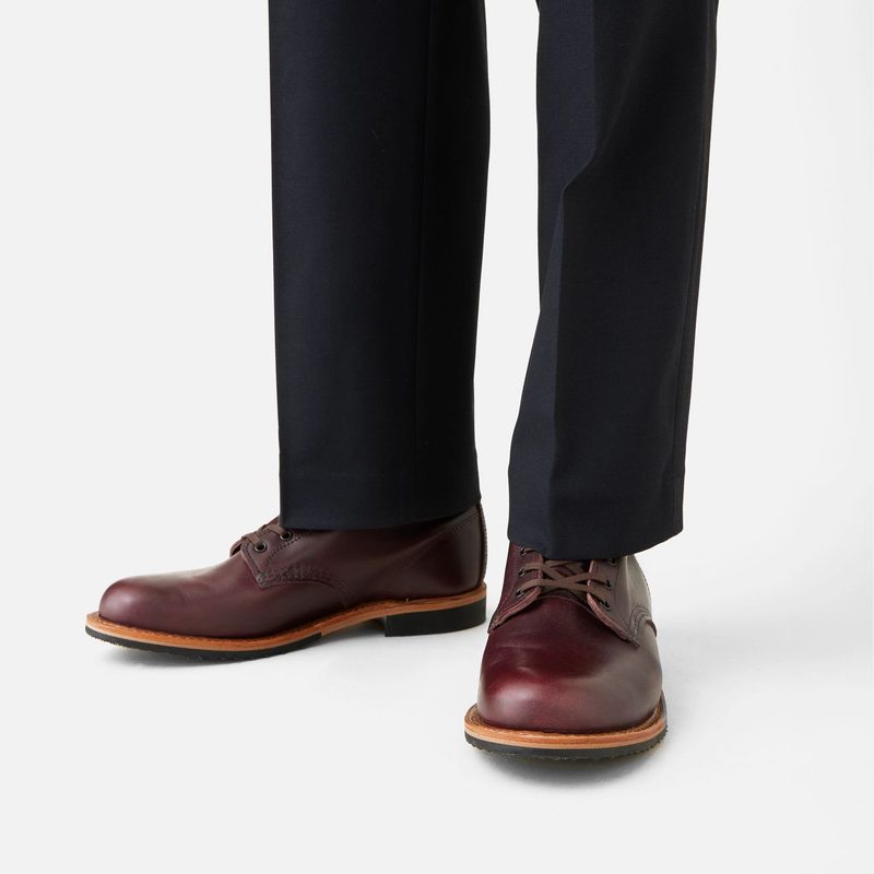 model wearing cherry brown beckman boot