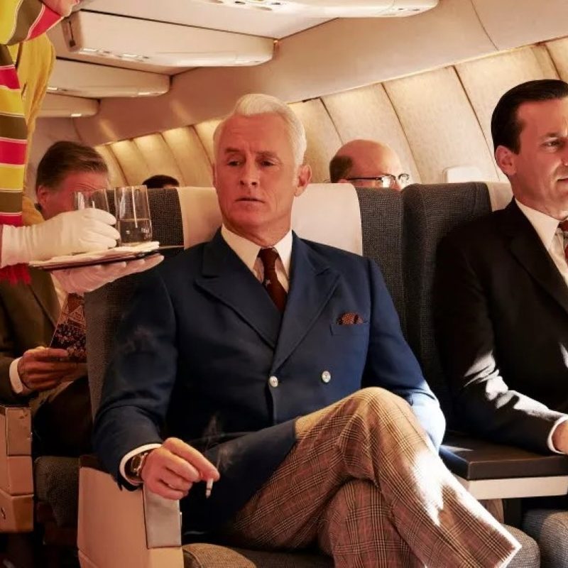Roger Sterling and Don Draper on plane
