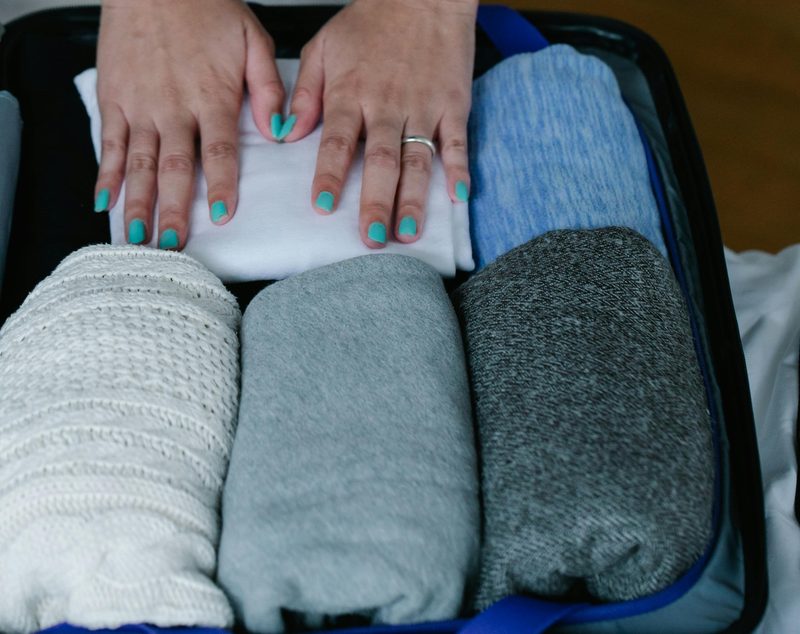 Rolled shirts in a suitcase