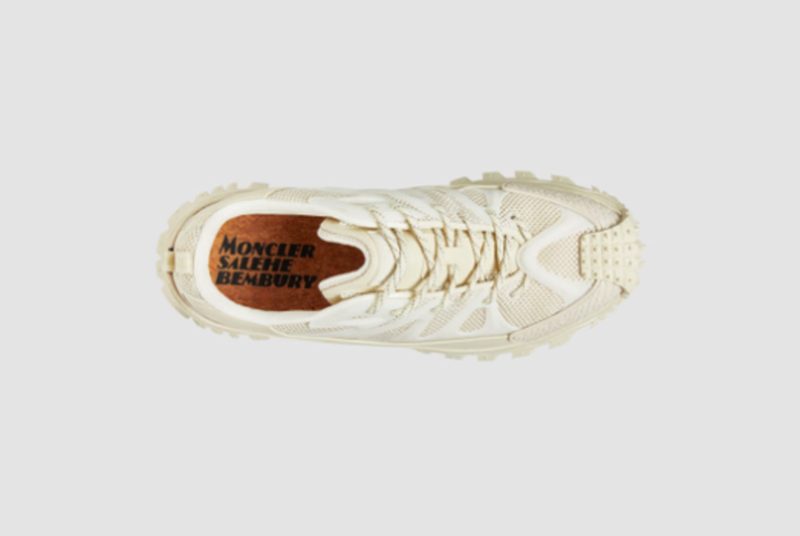 overhead view of white moncler sneakers
