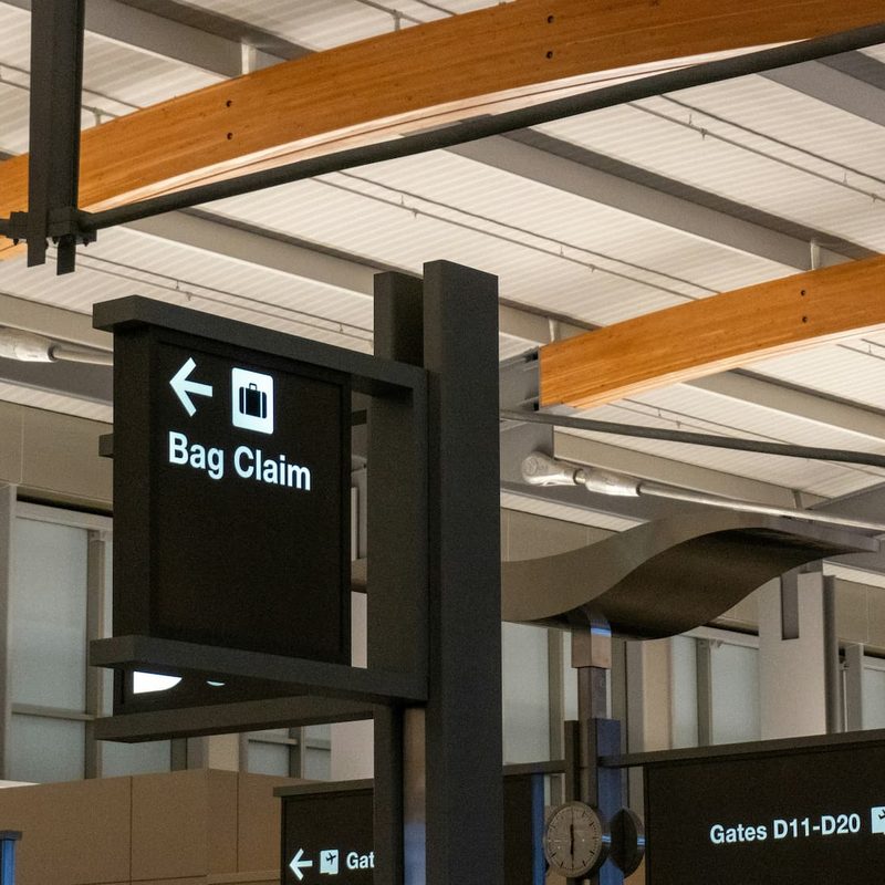 A "bag claim" sign in the airport