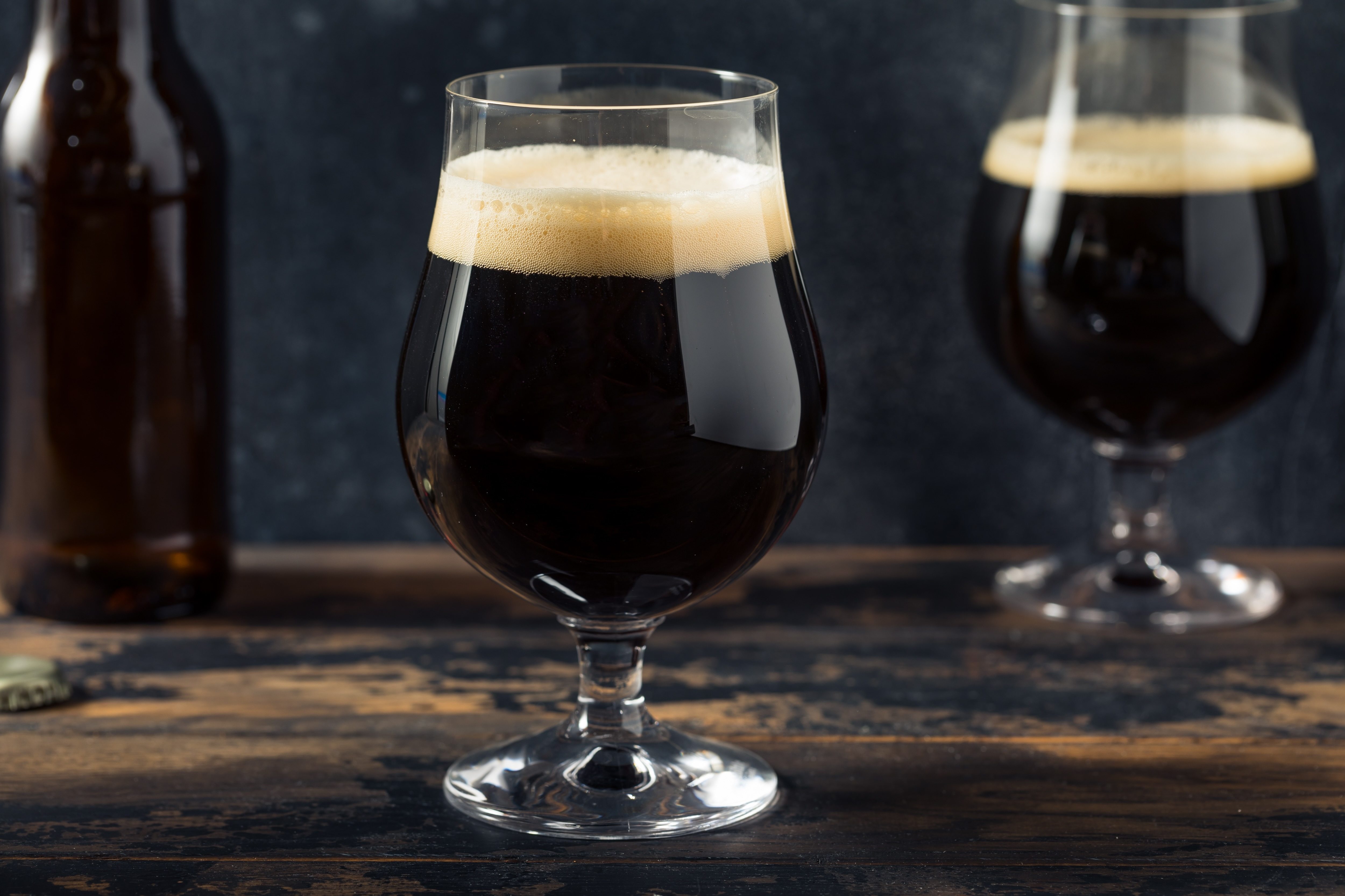 Boozy Cold Craft Porter Stout Beer in a Footed Glass