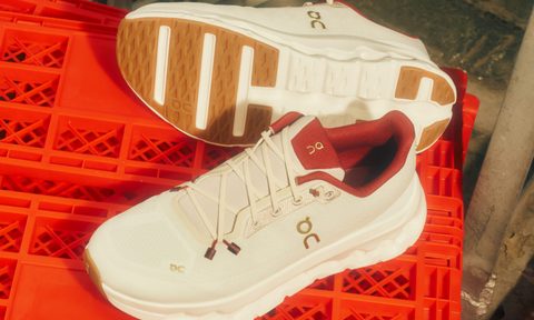 On sneakers on red crates