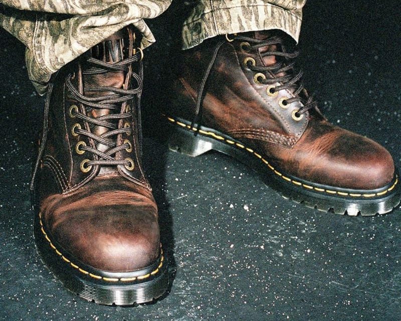 model wearing dr martens boots