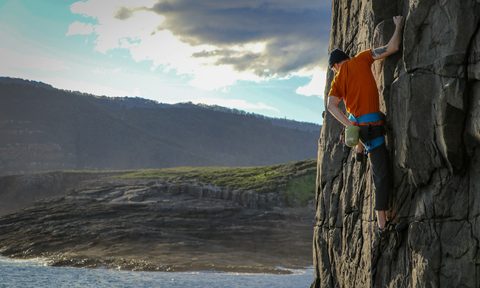 Man rock climbing at Mount Brown in Tasmania