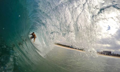 Surfer in barrel
