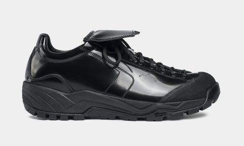 side view of patent black leather shoes