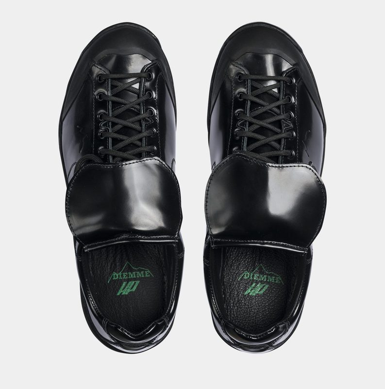 overhead pair of black patent sneakers