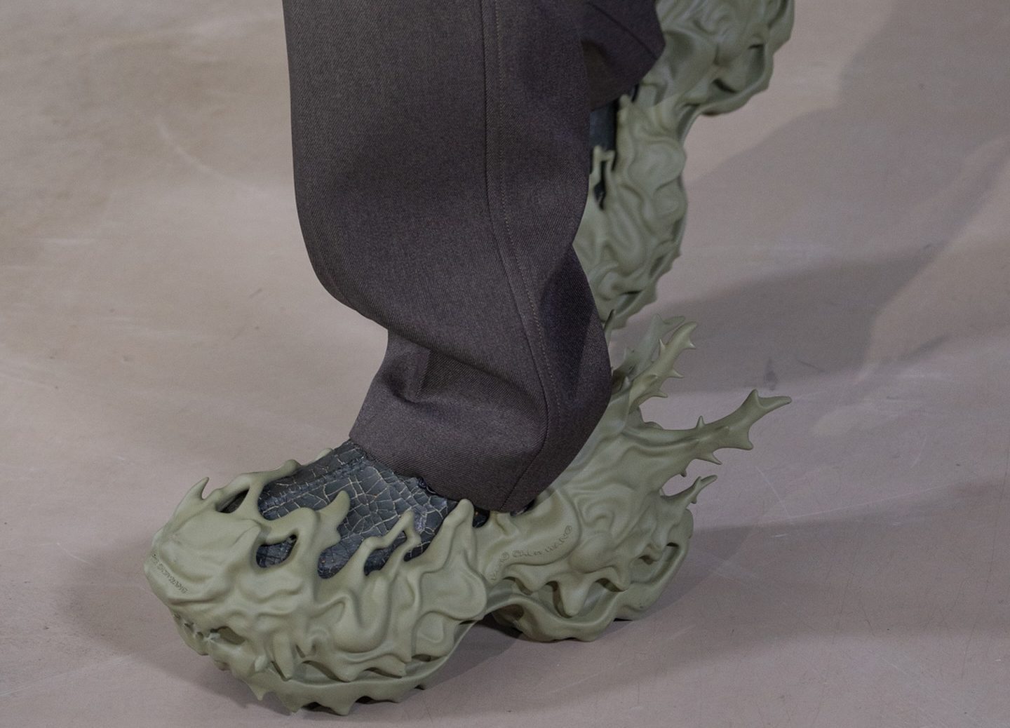 green ugg boots on runway