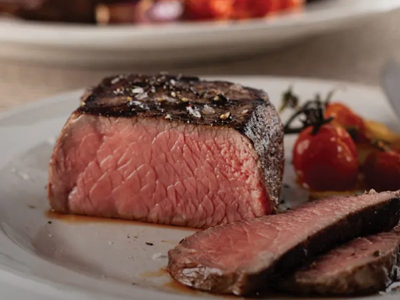 The Butcher's Cut Top Sirloins of Omaha Steaks' Semi-Annual Sale Collection on a plate.