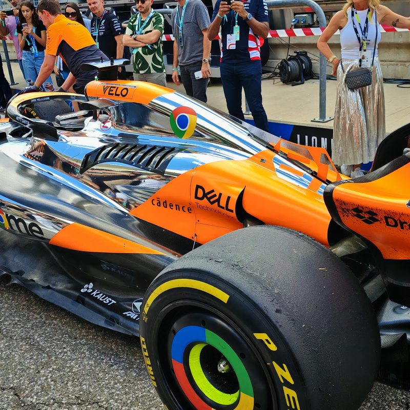 A McLaren F1 car being wheeled past during the 2024 US GP