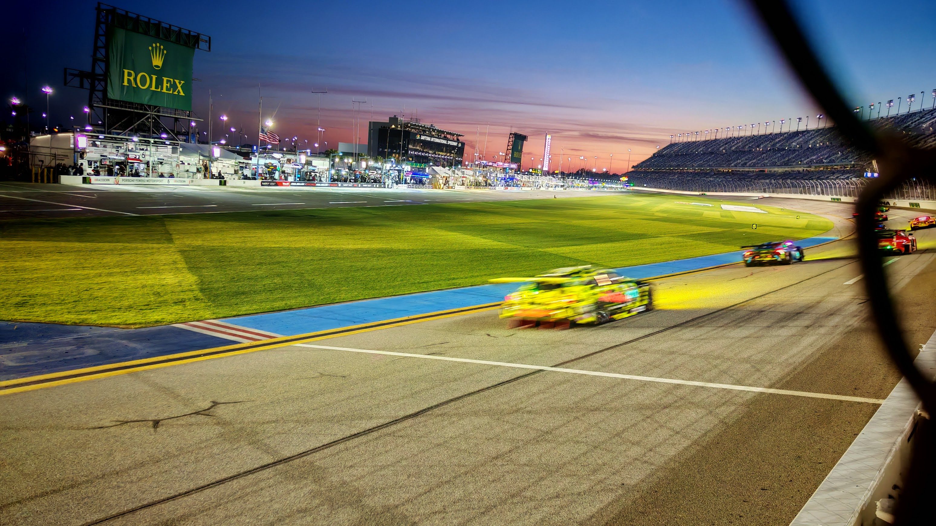 Cars going past on the Daytona International Speedway during the Rolex 24