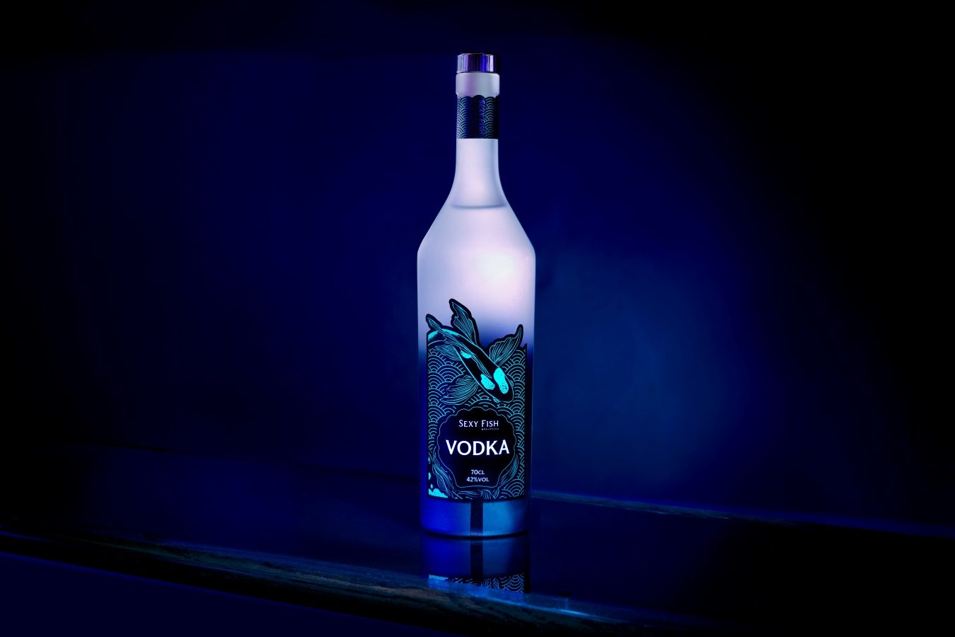 bottle of alcohol with fish lure Sporting Wood Darter Surfland Bait and Tackle Boating Magazine Drinking and fishing finally mix safely! Cackalacky Booze Bait Fishing Lure