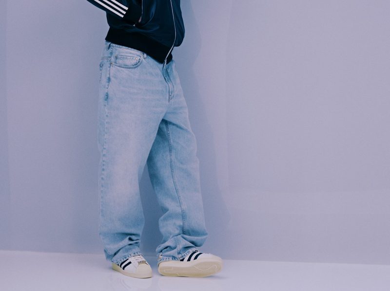 Ty Shawn wearing adidas superstar sneakers