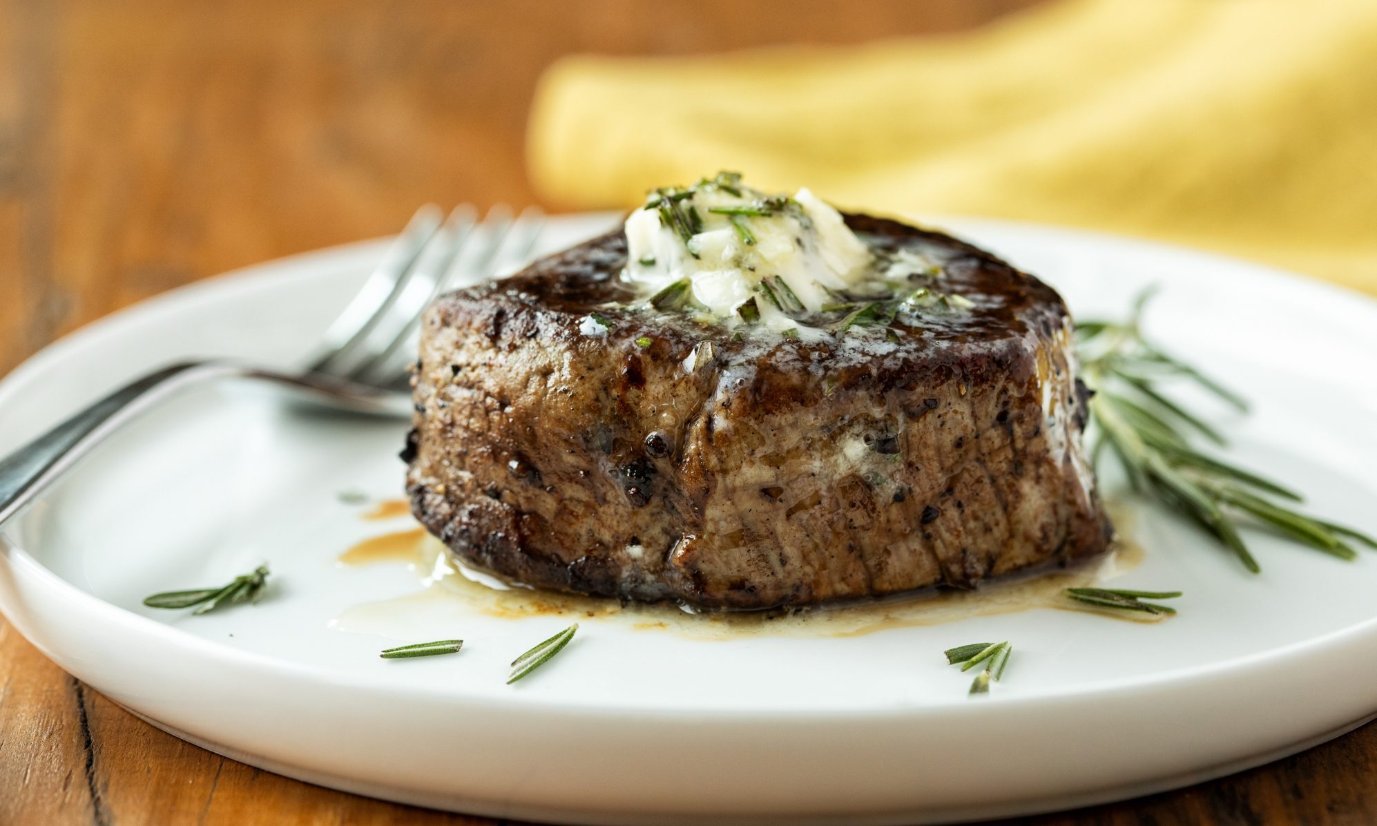 beef filet on white plate.