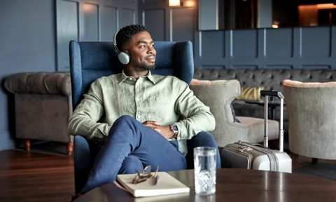 Man sitting in an airport lounge