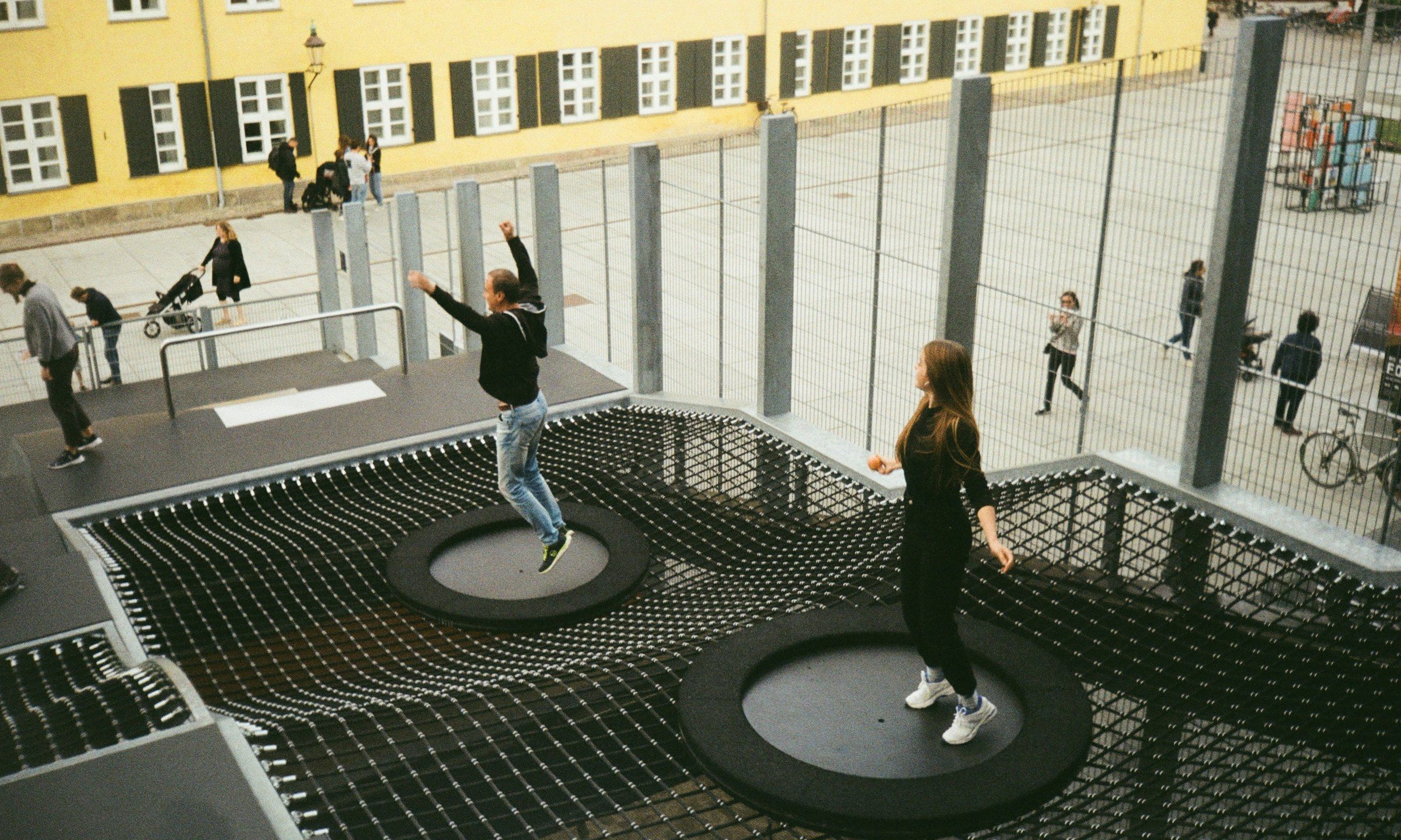 rebounder trampoline people jumping outside