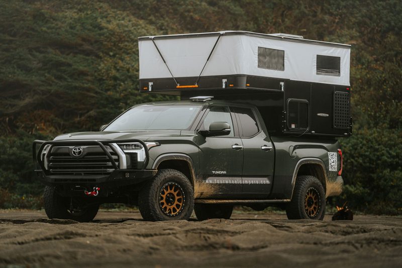 Four Wheel Campers' CampOut truck camper mounted on a Toyota Tundra pickup.