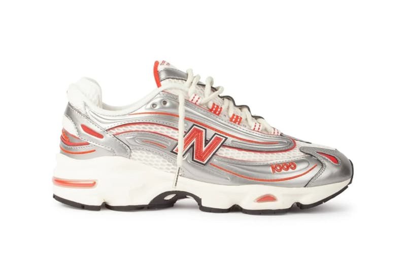 silver and orange new balance sneakers