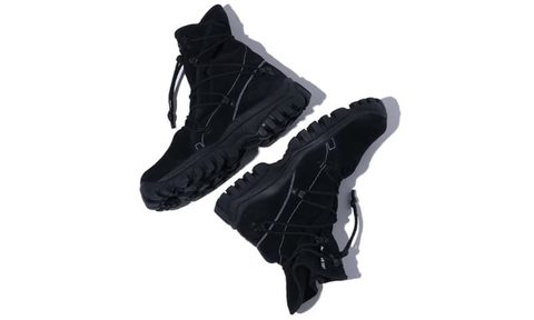 pair of black suede sneaker boots