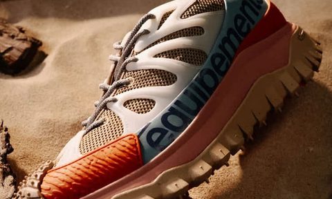 close up on moncler sneaker in dirt