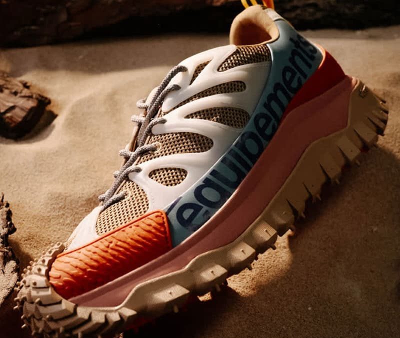 close up on moncler sneaker in dirt