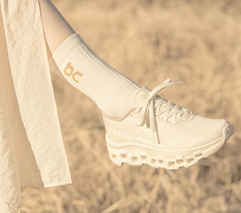 white on invincible shoe in midair
