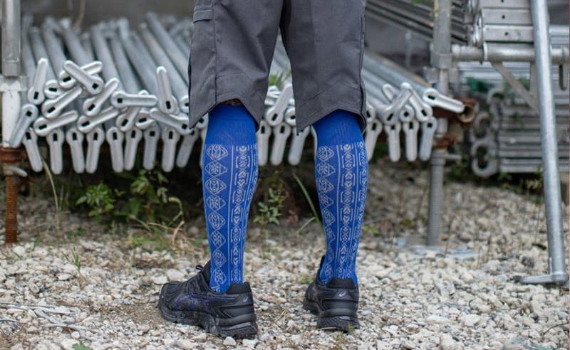 worker wearing asics kiko kostadinov next to steel