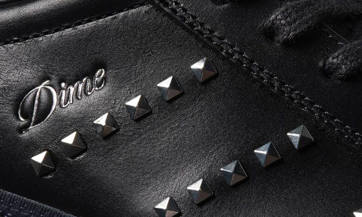 closeup on dime logo on adidas sneaker
