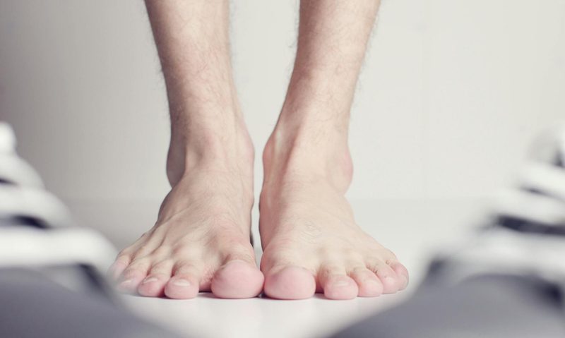 man feet barefoot