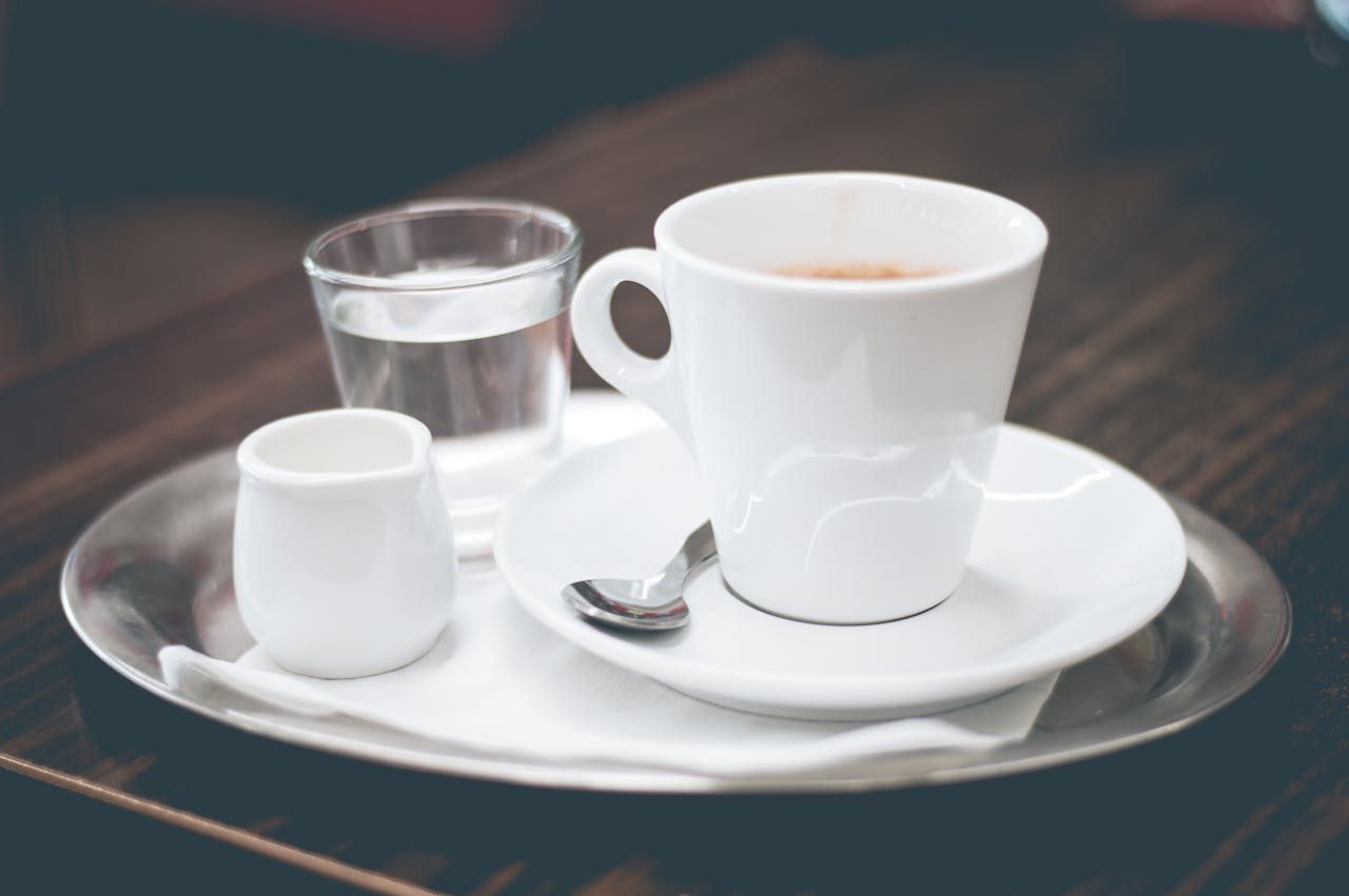 Coffee with cream on side
