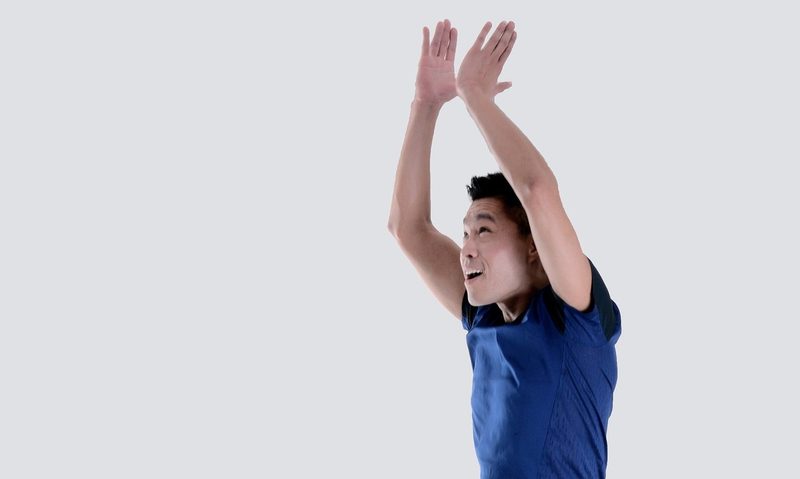 man jumping up doing burpee exercise