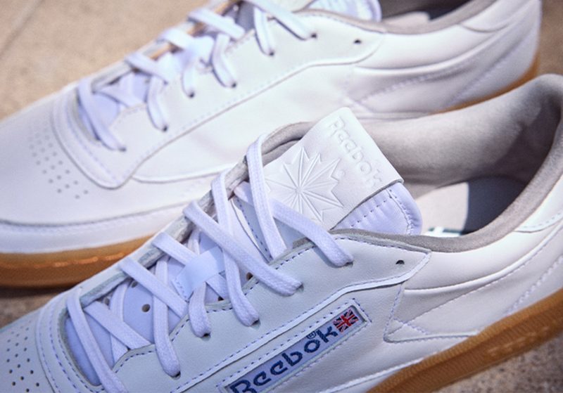 close up on white reebok sneakers