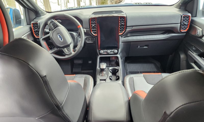 2024 Ford Ranger Raptor front seats, center console, and dashboard.
