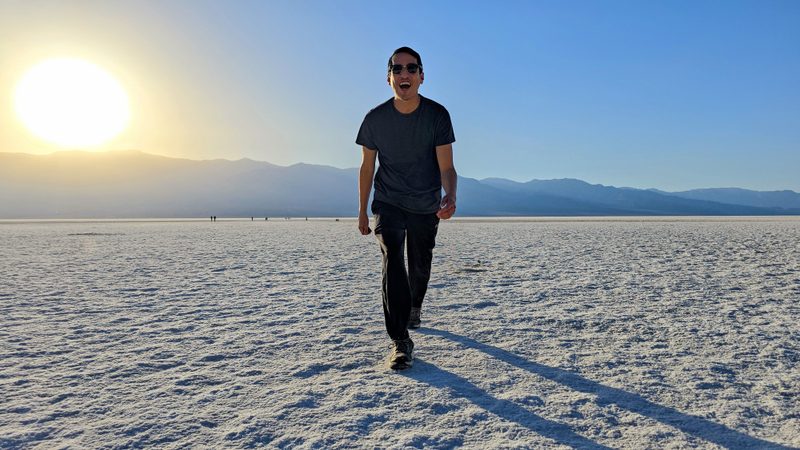 Raul Mercado walking on the sand flats of Death Valley