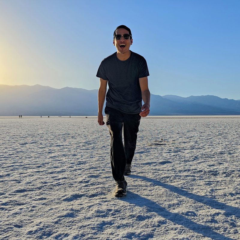 Raul Mercado walking on the sand flats of Death Valley