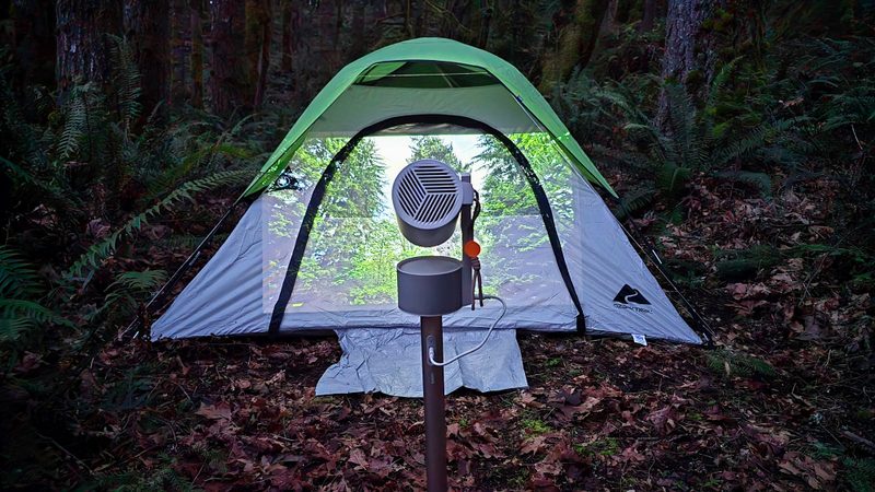 XGIMI projector on a tent wall at night